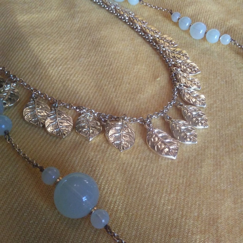 Lot of 2 gold toned necklaces- jcrew and leaves
